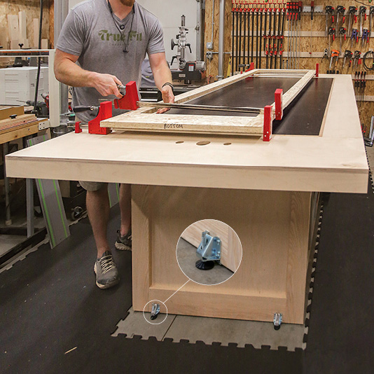 Photo of a custom-height assembly table in Casey Knips' shop.