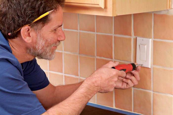 Remove electrical outlet faceplates, saving the screws in a labeled, plastic bag.