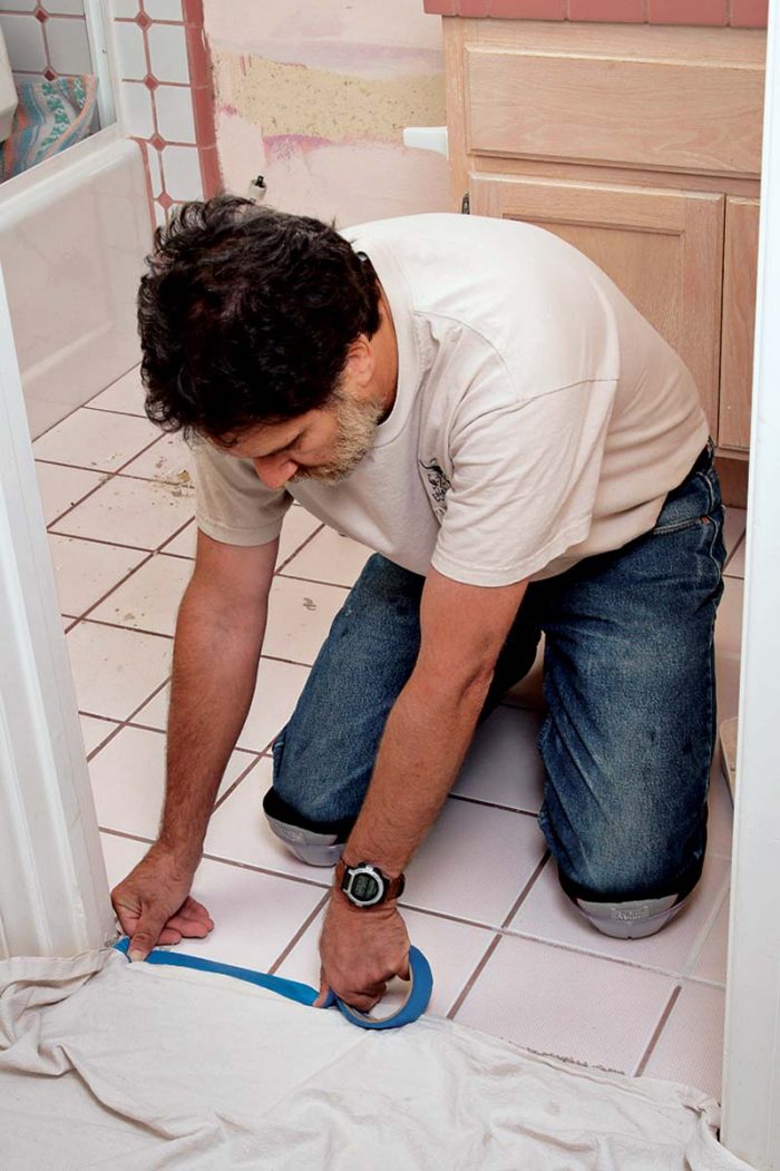 Tape a towel or tarp to the carpeting to prevent soiling it.