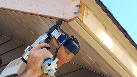 Installing a creme colored aluminum soffit