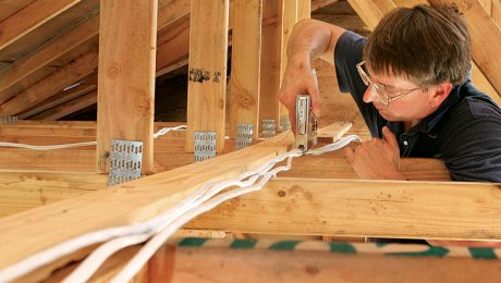 electrician running wires in new home