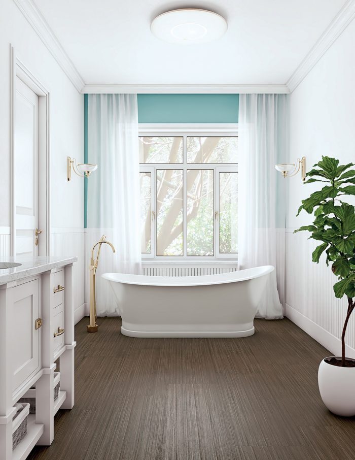 Linoleum flooring implemented into a bathroom.