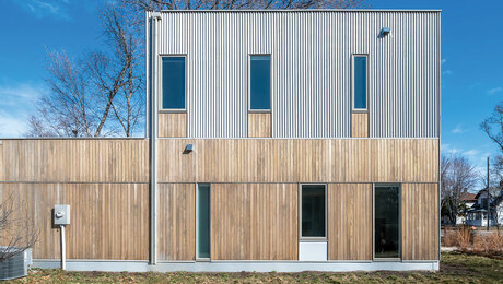 three-bedroom house with SIP wall construction and a flat roof