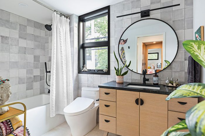 Modern bathroom with gray and light wood