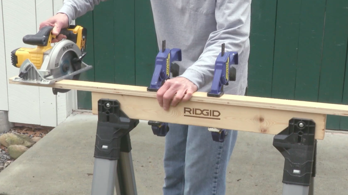 Patrick demonstrating use of the Rigid sawhorse