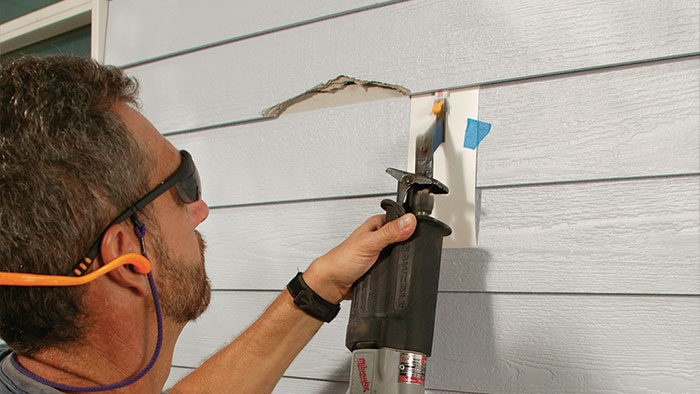 remove broken clapboard siding