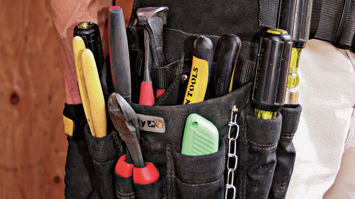 tool belt full of electrical tools